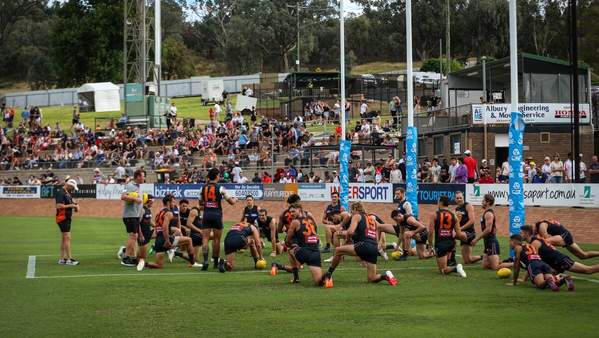 GIANT OCCASION: The GWS Giants go through their pre-match routine before taking on the Sydney Swans.