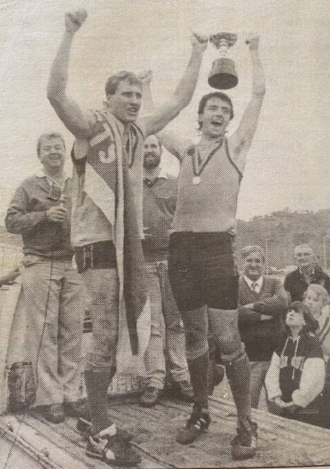 Mack and Copley celebrate the Brookers' 1991 flag victory over Bethanga. Picture supplied