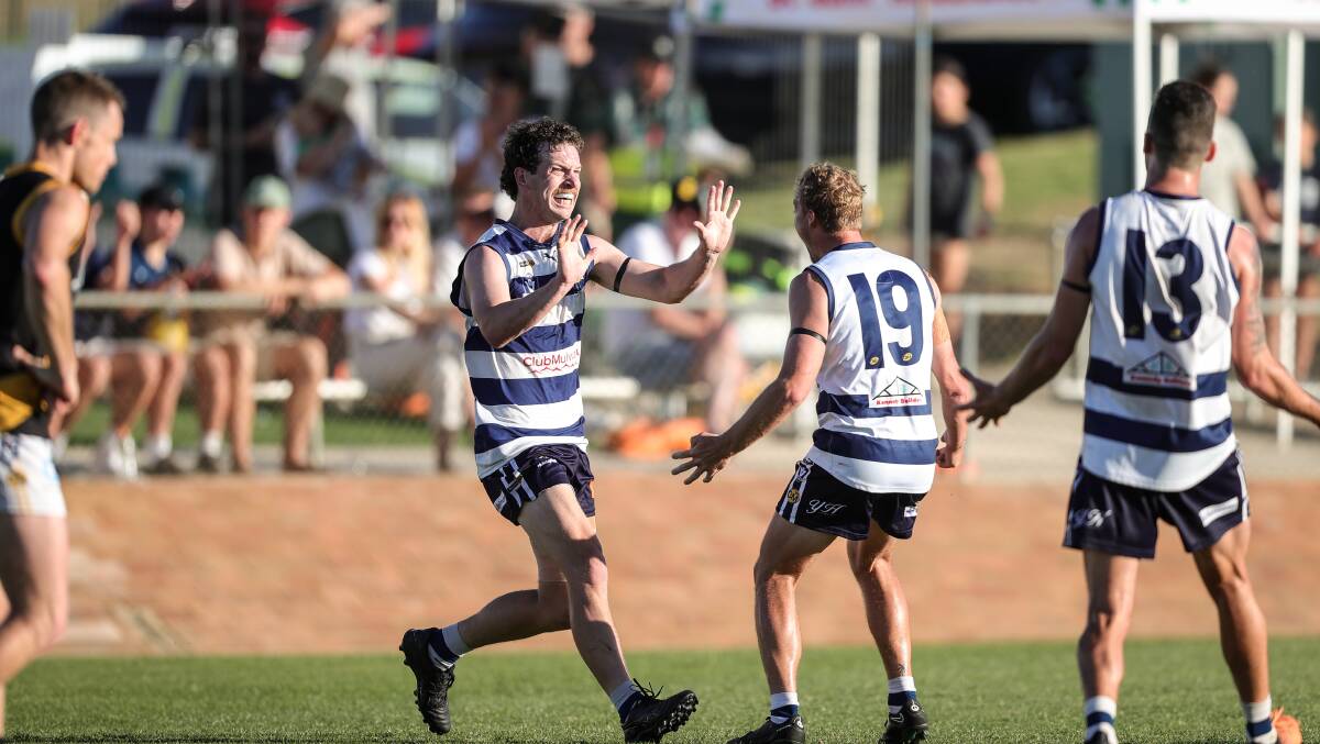 Yarrawonga's Ryan Bruce celebrates his match-winning goal with Jess Koopman. Picture by James Wiltshire