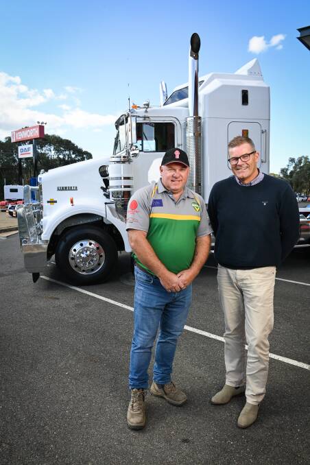 Holbrook president Anthony Churchill with Justin Brooks who is co-owner of Twin City Truck Centre. 