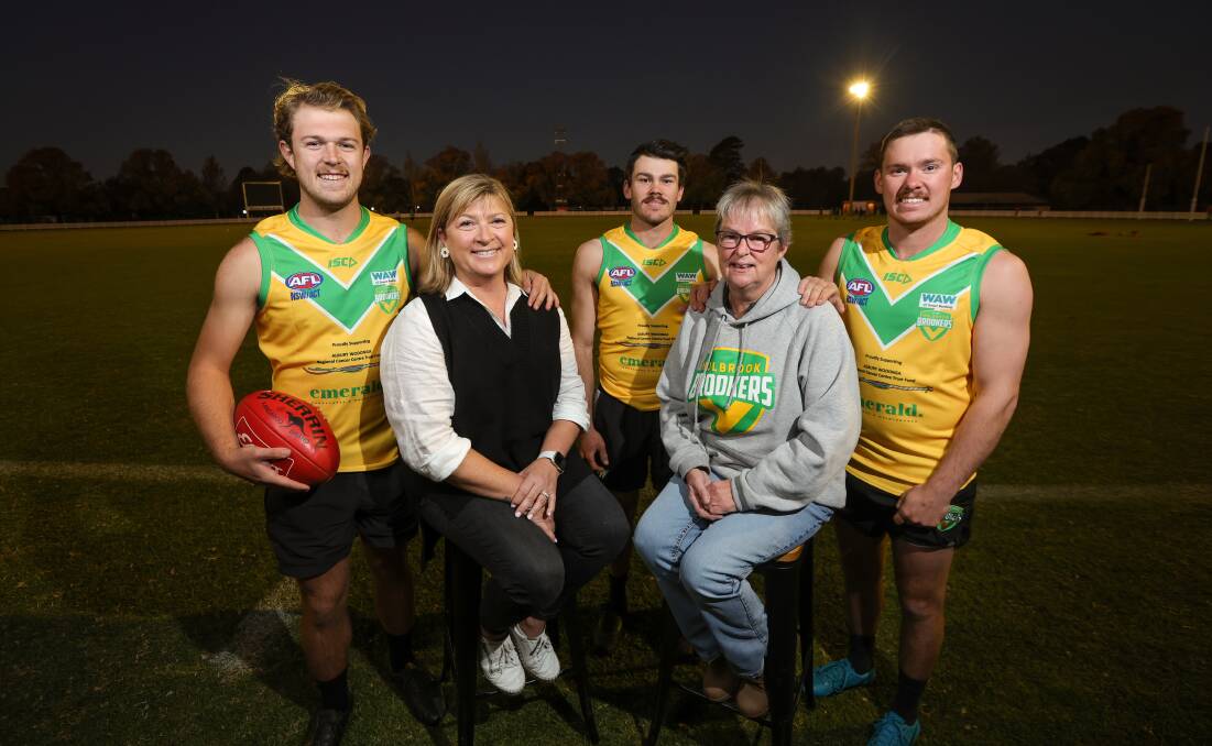 Holbrook's Bailey and Melissa Churchill, Matthew and AJ Bender with mum, Carla with the specially designed jumpers to be worn on Saturday. Picture by James Wiltshire