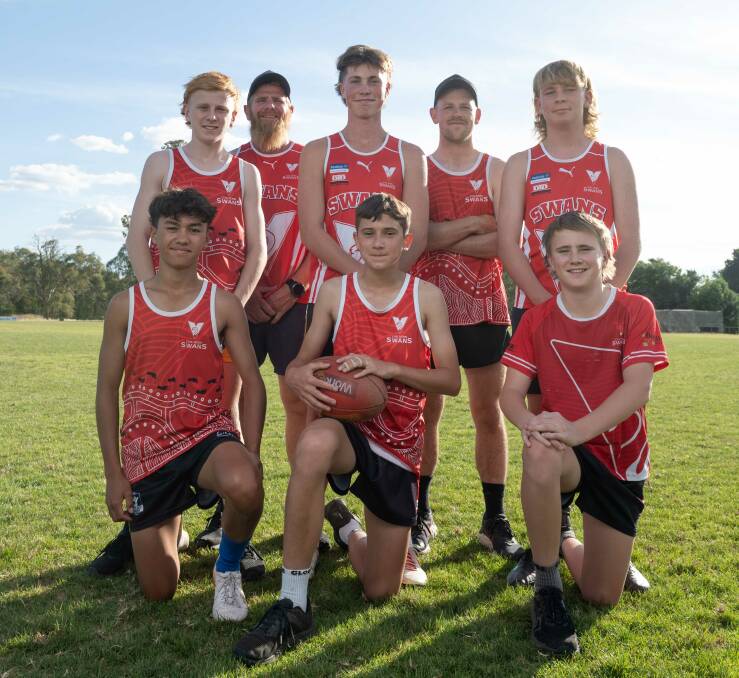 Some of Chiltern's junior players who are set to benefit from the free registration provided by the club with fourths coach Wayne Shannon and Swans senior co-captain Jayden Vandermeer. Picture by Tara Trewhella