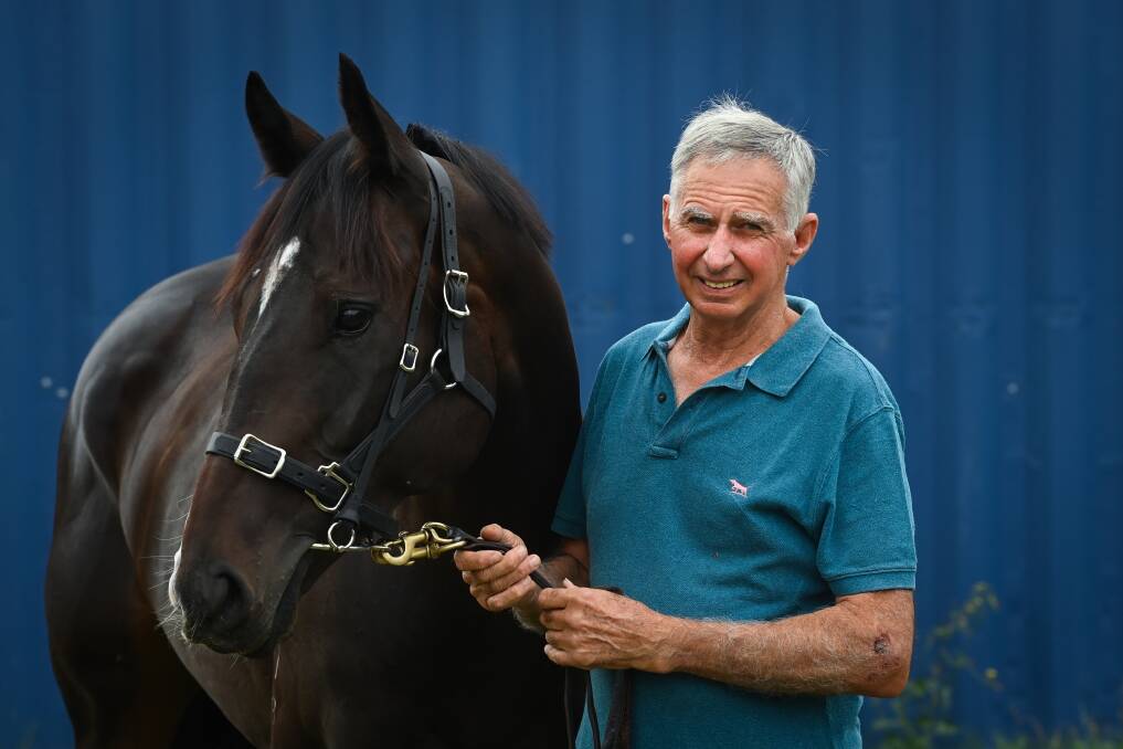 Trainer Ron Stubbs with his slick sprinter Sparring who will be looking to return to form at Wagga on Friday. Picture by Mark Jesser