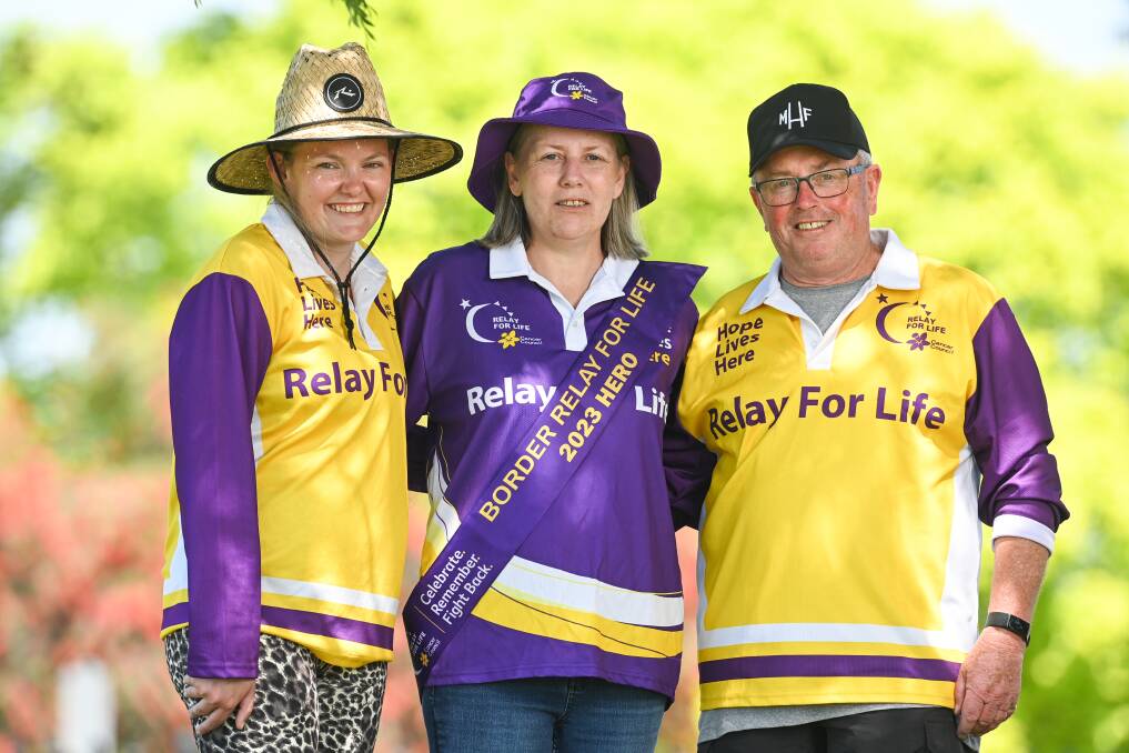 Border Relay for Life 2023 Hero Katrina Coleman (centre) with organising committee members Rhiannon Grazules and Peter Whitmarsh ahead of the 21st annual event at Albury's Alexandra Park. Picture by Mark Jesser