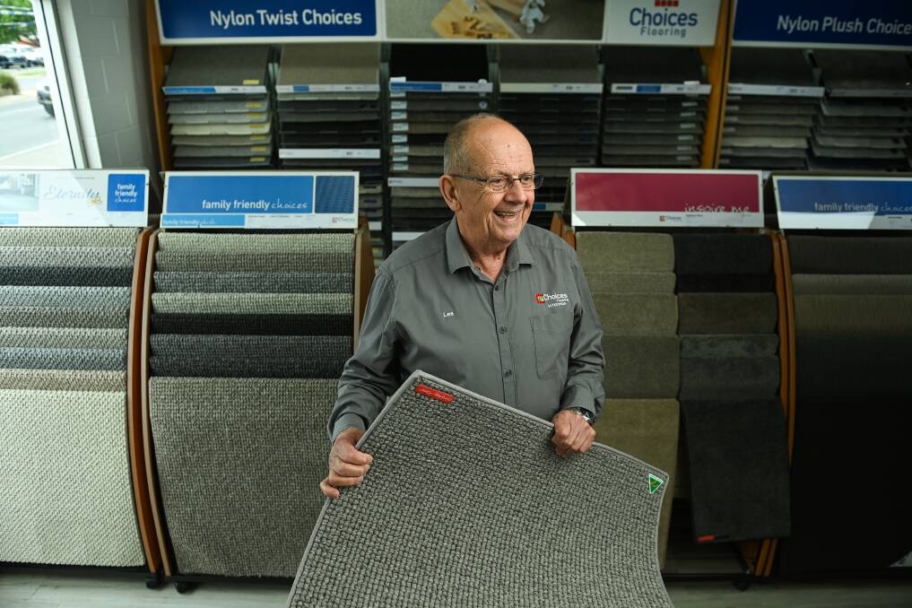 At 76 years of age, Les Schmutter still gets huge enjoyment from his job as a flooring salesman and says it keeps his mind active. Picture by Mark Jesser