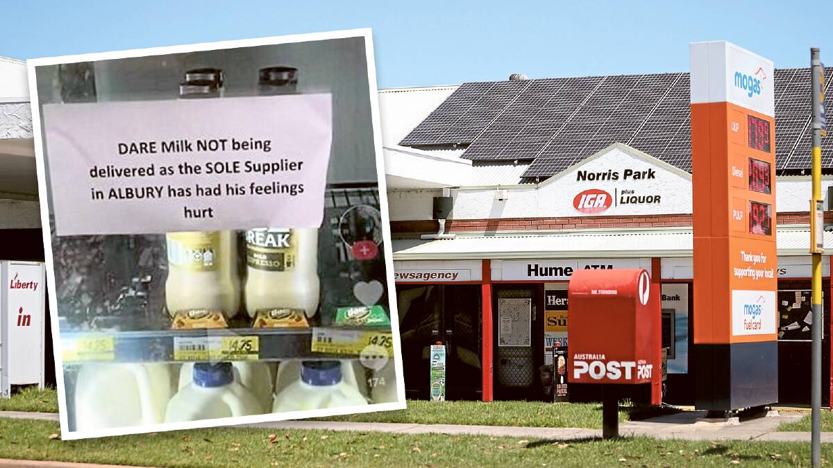 Norris Park IGA displayed signs on its milk fridges (inset) to voice its frustration about a supply dispute regarding Dare iced coffee milk. Main picture by James Wiltshire. Inset image supplied