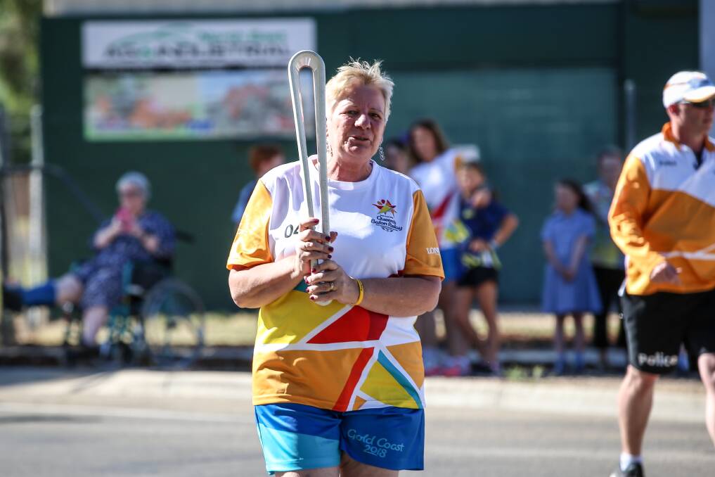 Josie Cornish completes her leg of the 2018 Commonwealth Games Queen's Baton Relay in Wangaratta in 2018. Picture by James Wiltshire