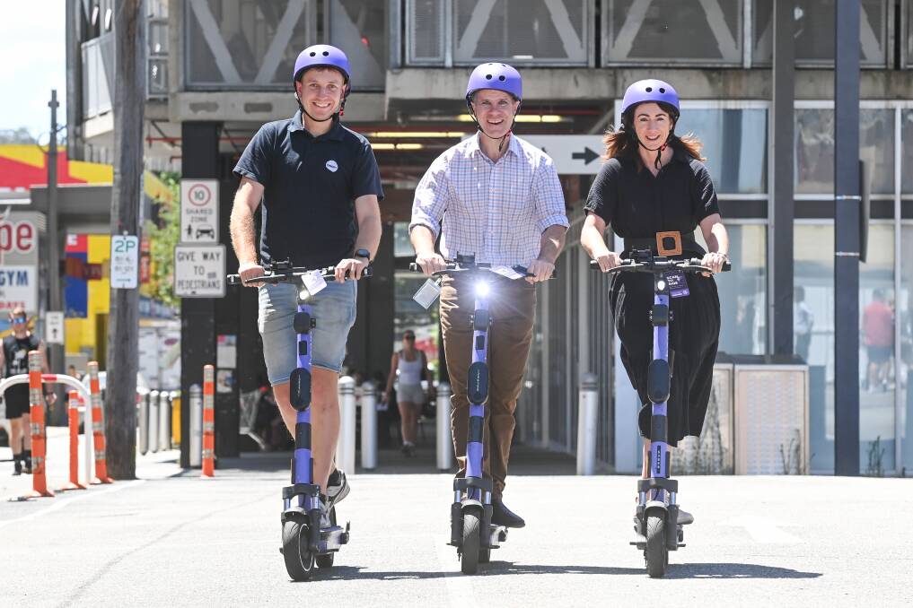 Beam NSW regional operations manager Ned Dale, Albury MP Justin Clancy and Albury mayor Kylie King put the e-scooters to the test on Friday, December 15, to mark the start of a 12-month trial in the Border city. Picture by Mark Jesser