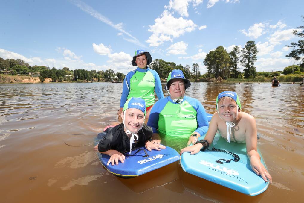 Abby McMillan, 13, Lara Belci, VicSwim regional coordinator Naarah Bretton and Ned McMillan, 11, are excited to be starting the North East's first inland swimming program at Beechworth's Lake Sambell. Picture by James Wiltshire