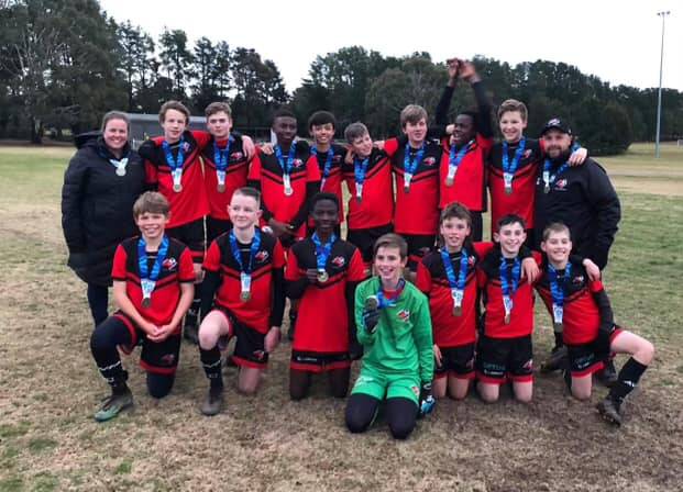 CHAMPIONS: Albury-Wodonga Football Association's under-13 boys braved the bitterly cold conditions to capture the NSW Country title at Orange on the weekend.