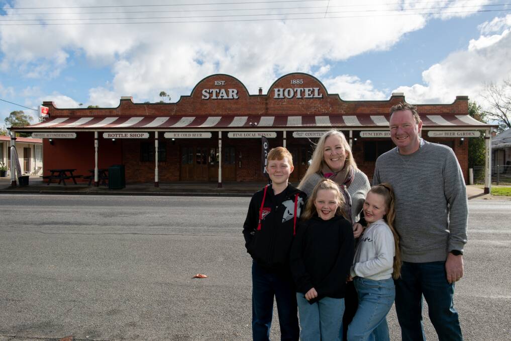 Kathryn and Matt Clarke, with their children Michael, 11, Olivia, 8, and Charlie, 8, are excited to provide a great service to the community as the new publicans of the Barnawartha Star Hotel. Picture by Tara Trewhella