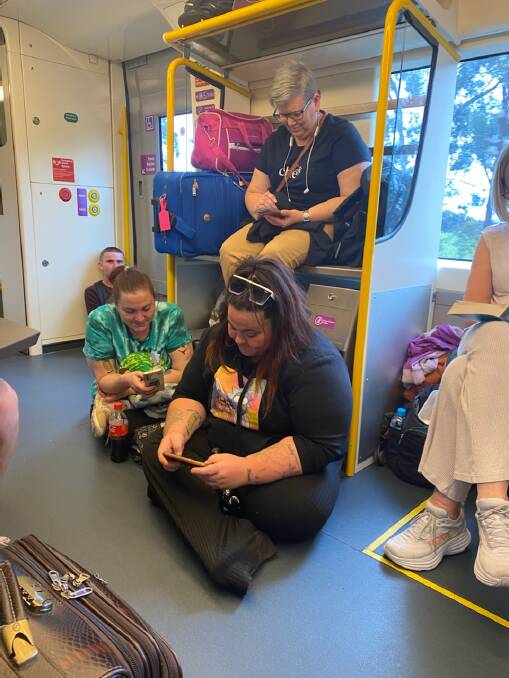 Passengers on the Sunday 12.04pm V/Line service from Melbourne to Albury were forced to sit on the floor and on luggage racks for the entire journey. Pictures supplied