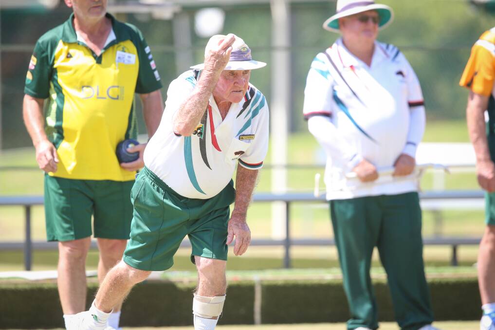 WELL BOWLED: Lavington's Les Waldron acknowledges an excellent shot from a teammate during Saturday's grade three pennant clash against North Albury at Lavington. Picture: JAMES WILTSHIRE