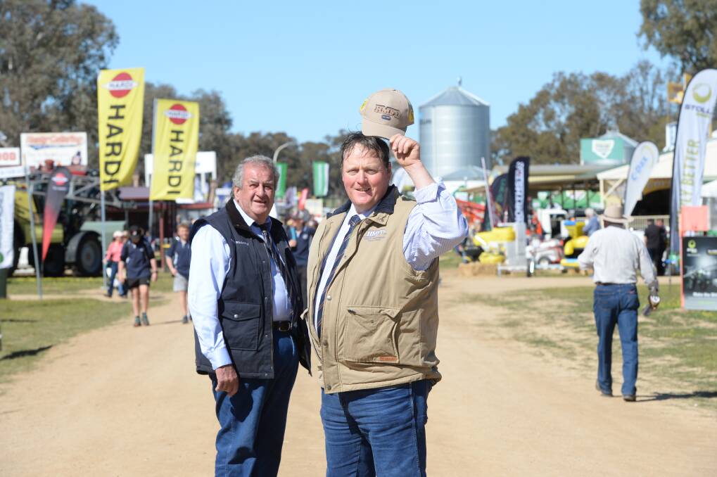 Former Henty Machinery Field Days chairman Ross Edwards and current chairman Nigel Scheetz. File picture