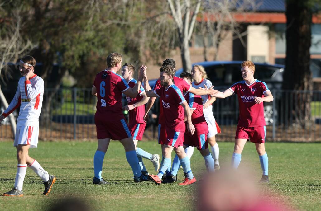 WAITING GAME: Twin City celebrates a goal at Kelly Park last year. The Wanderers will play the first half of the AWFA season away from home due to major upgrades at their home ground.