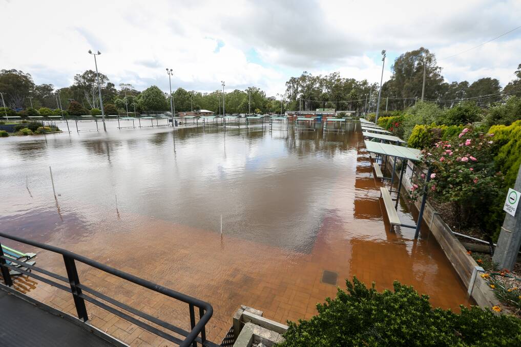 All four of Corowa Civic Bowls Club's greens, as well as the croquet surface, were underwater on Monday morning as the Murray River level exceeded eight metres. Picture by James Wiltshire