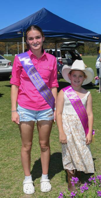 Culcairn Show's 2023 intermediate showgirl Maddy Wood, 13, and junior showgirl Dulcie Phillips, 9, with their sashes. Picture by Tara Trewhella