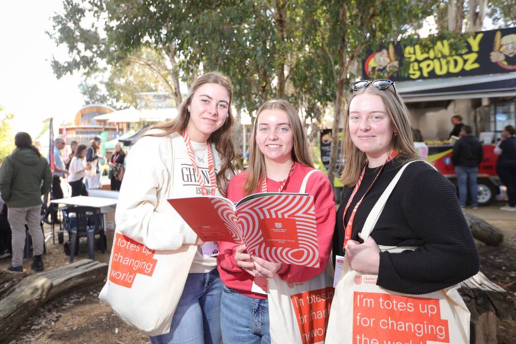 Milawa's Charlotte Tilbrook, 17, with Moyhu's Bree Finger, 17, and her sister Amber Finger, exploring future course options at the Charles Sturt University open day in Albury on Sunday, August 13. Picture by James Wiltshire