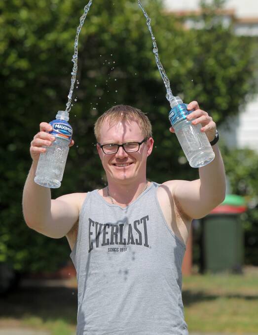 HAPPY NEW YEAR: Daniel Bormann will ring in the new year with his favourite drop - water. He gave up alcohol a year ago. Picture: BLAIR THOMSON