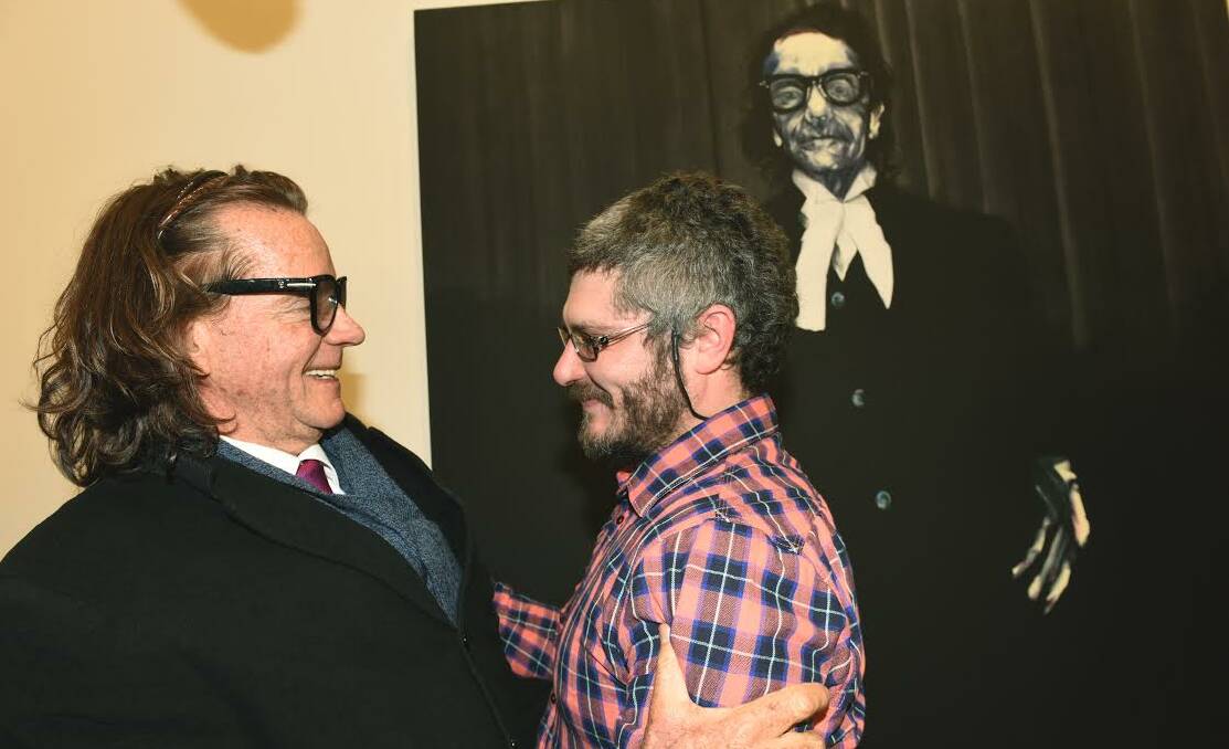 SMILES ALL ROUND: Albury-born barrister Charles Waterstreet congratulates artist Nigel Milsom on his Archibald-winning painting. Picture: FAIRFAX