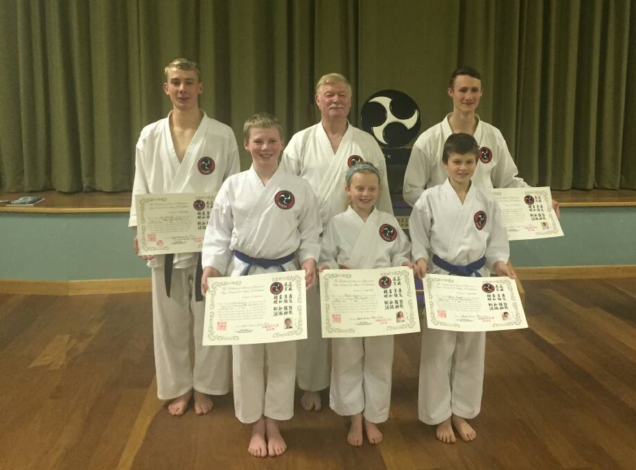 Karate kids: Instructor Garry O'Çonnor (middle rear) with his students Beau Dalwood and Dane Sever (back) and Jack Rawlings, Tahlia Seymour and Jamon Seymour (front).