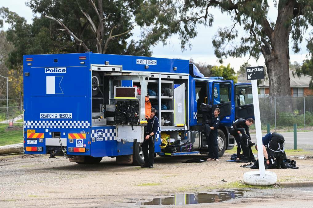 SEARCH: Specialist police divers were used to search House Creek in relation to the alleged crime. 