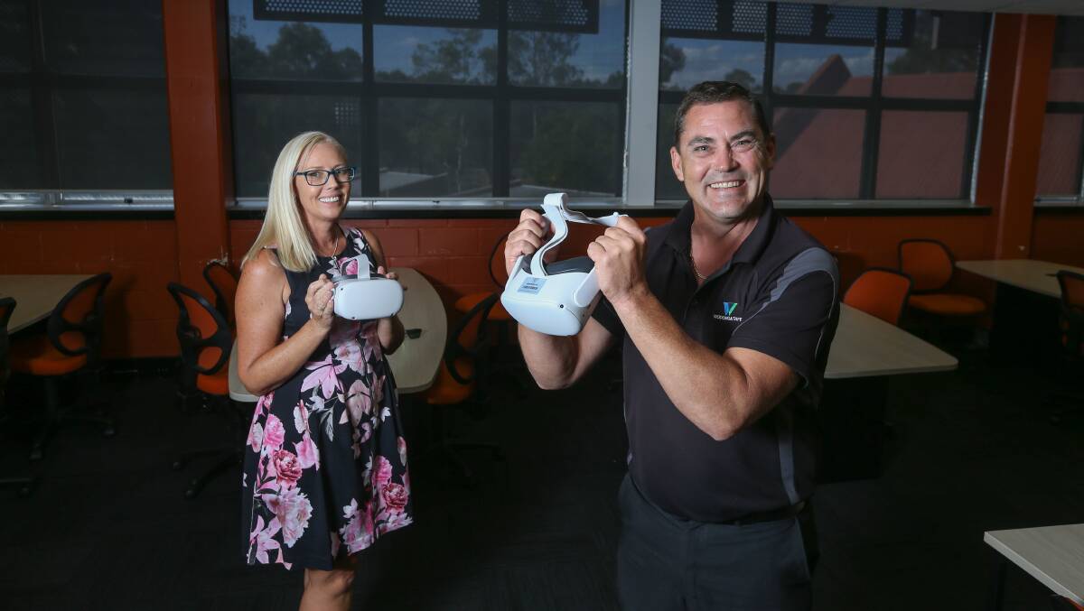 PILOT: Community services and health department manager Fiona Maher and Craig Johnstone, education leader, with VR headsets that will be used for disability training in a pilot. Picture: TARA TREWHELLA 