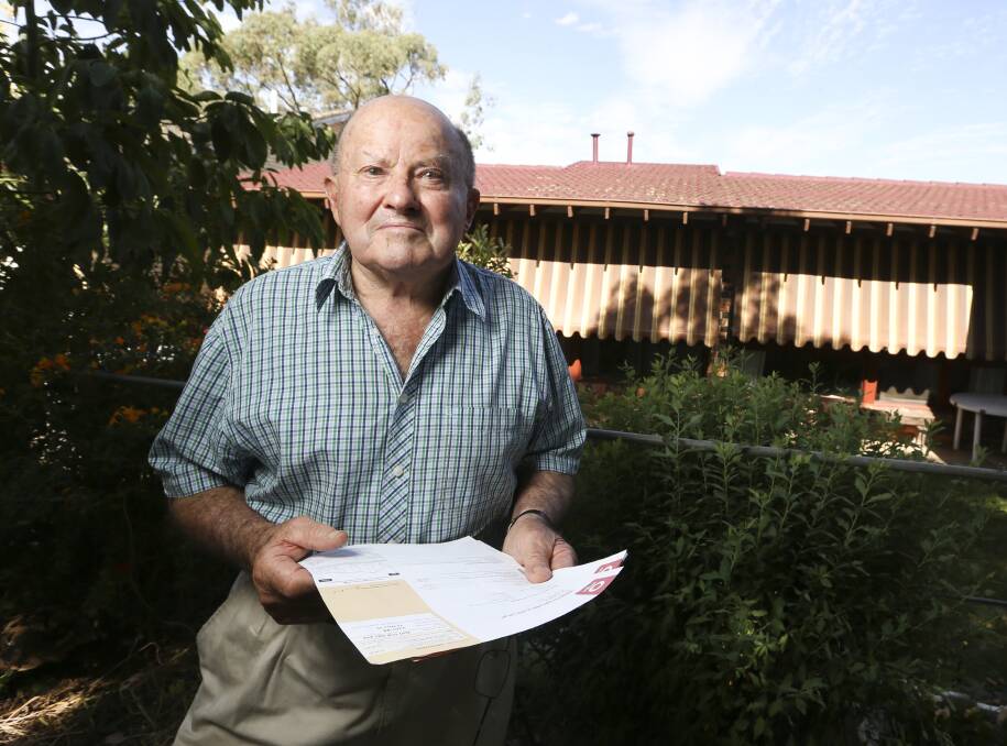 ANSWER IN THE SKY: Albury retiree Ken Kurnow will consider taking up solar if prices rise by 17 per cent in the worst-case scenario of the Australian Competition tribunal. Picture: ELENOR TEDENBORG