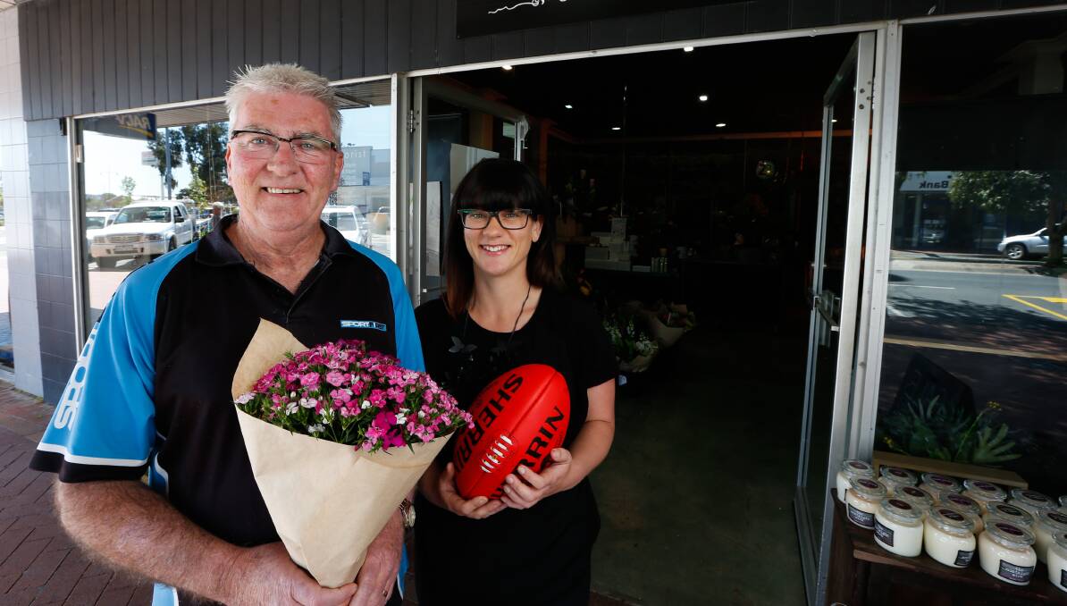 AGAINST THE ODDS: Mick Hales, from Sportfirst, and Emma Dixon, from Jannoel Florist, will open AFL grand final holiday. Picture: MARK JESSER