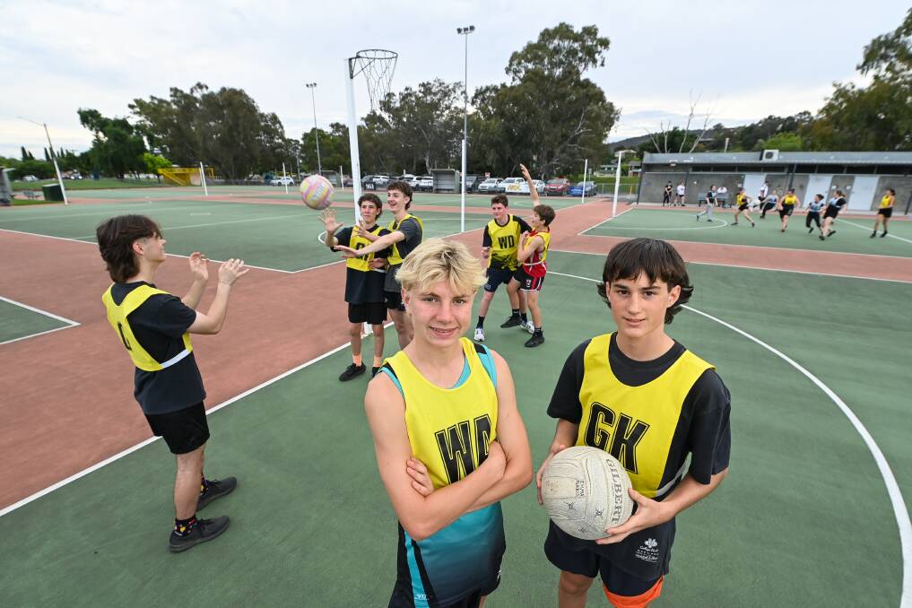 Blake Morgan, 13 and Lucas Williams, 13 with some other boys playing in the mixed competition. The Albury Netball Association hopes to start a male competition. Picture by Mark Jesser