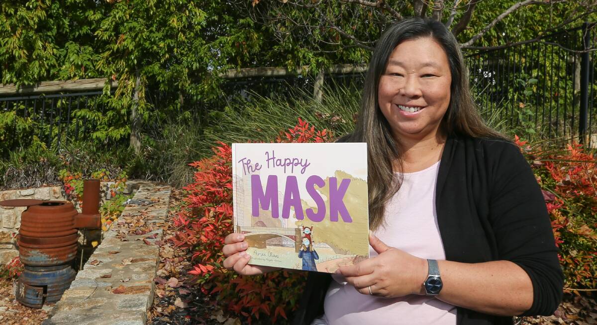 LIVING IN HISTORY: Albury's Aimee Chan has written her third children's book The Happy Mask. Her latest book focuses on how children experienced the pandemic. Picture: TARA TREWHELLA 