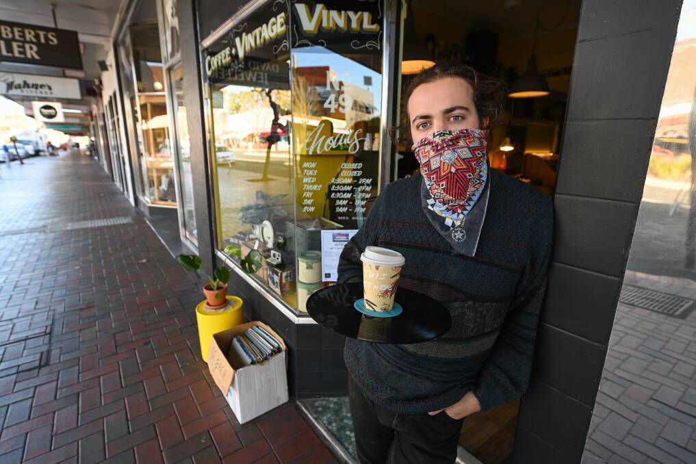 SUPPORT NEEDED: Ben Nyman who owns No 49 Expresso Bar in Wangaratta. He opened his coffee and vinyl shop July last year and business was starting to build up. Picture: MARK JESSER 