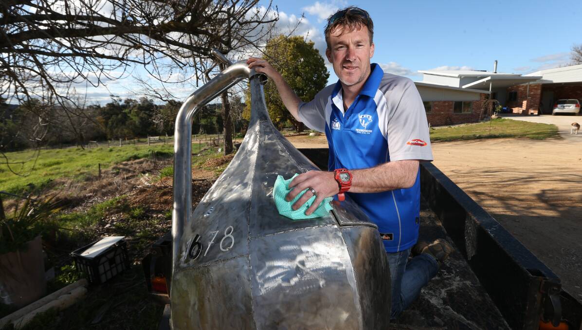 DONE: Dave McAuliffe hopes his water drop mailbox will finally sit in place without any problems after thefts and a confiscation by VicRoads. 