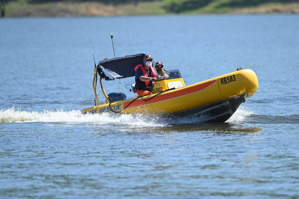 TRAINING: Wodonga SES member Warrick Armstrong and Tallangatta volunteer Mel Murray test out the new vessel on Lake Hume at Tallangatta on Saturday. The boat has a wide variety of uses.