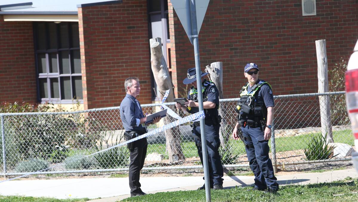 Police at the scene of Friday morning's stabbing on White Street in Wangaratta. Picture by Blair Thomson