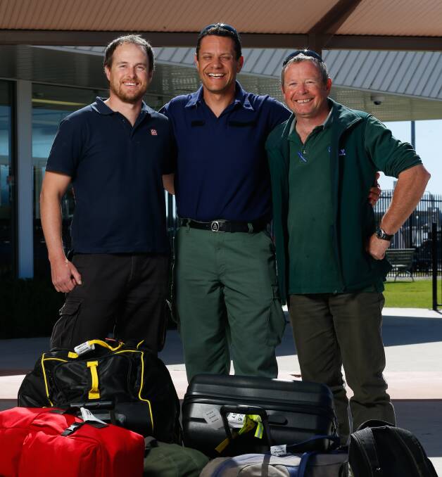 RETURNED: Firefighters Justin Tilson, John Costenaro and Tony Grey back in Albury after their stint battling fires in the United States. Picture: MARK JESSER