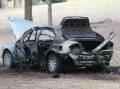 The burnt out Ford Fairmont in Dr James Taverney Park in Wodonga, off Gardner Street. Picture by Blair Thomson