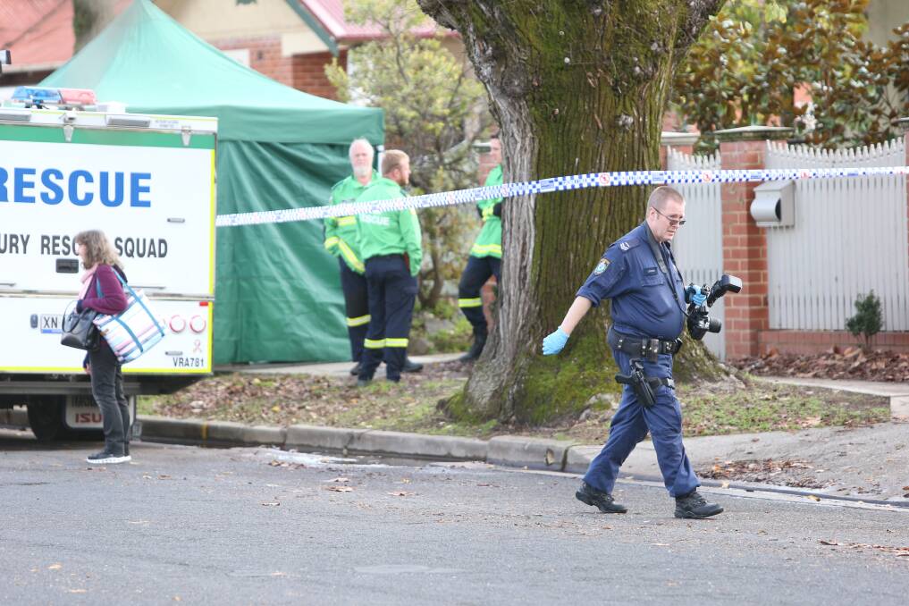 The man's body was found on a footpath on Stanley Street on Saturday. 