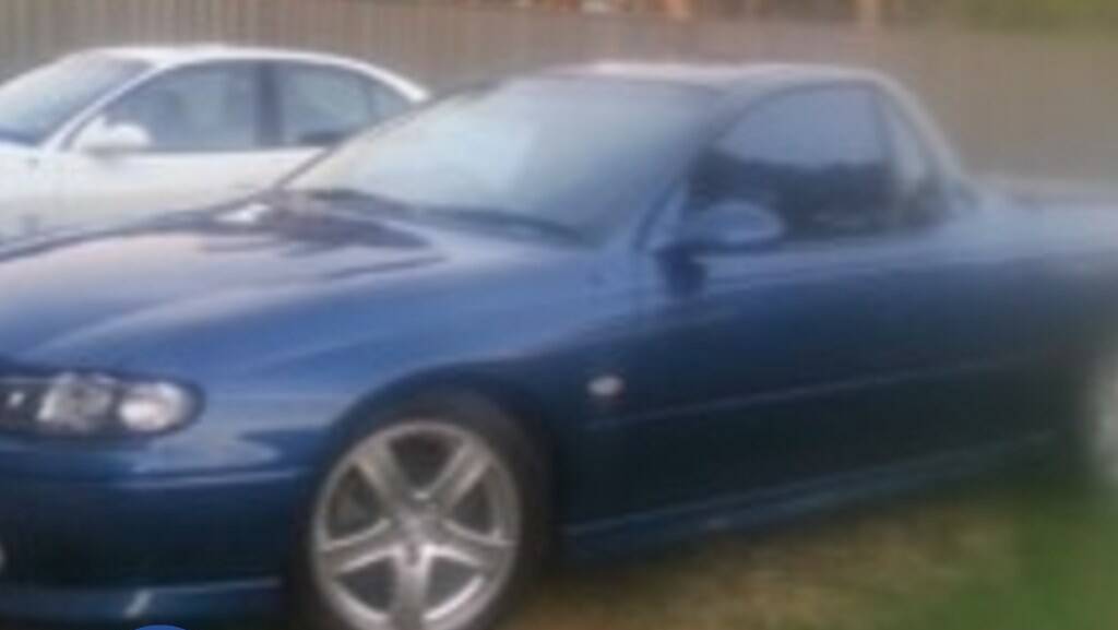 An image released by police showing a blue Holden utility. 