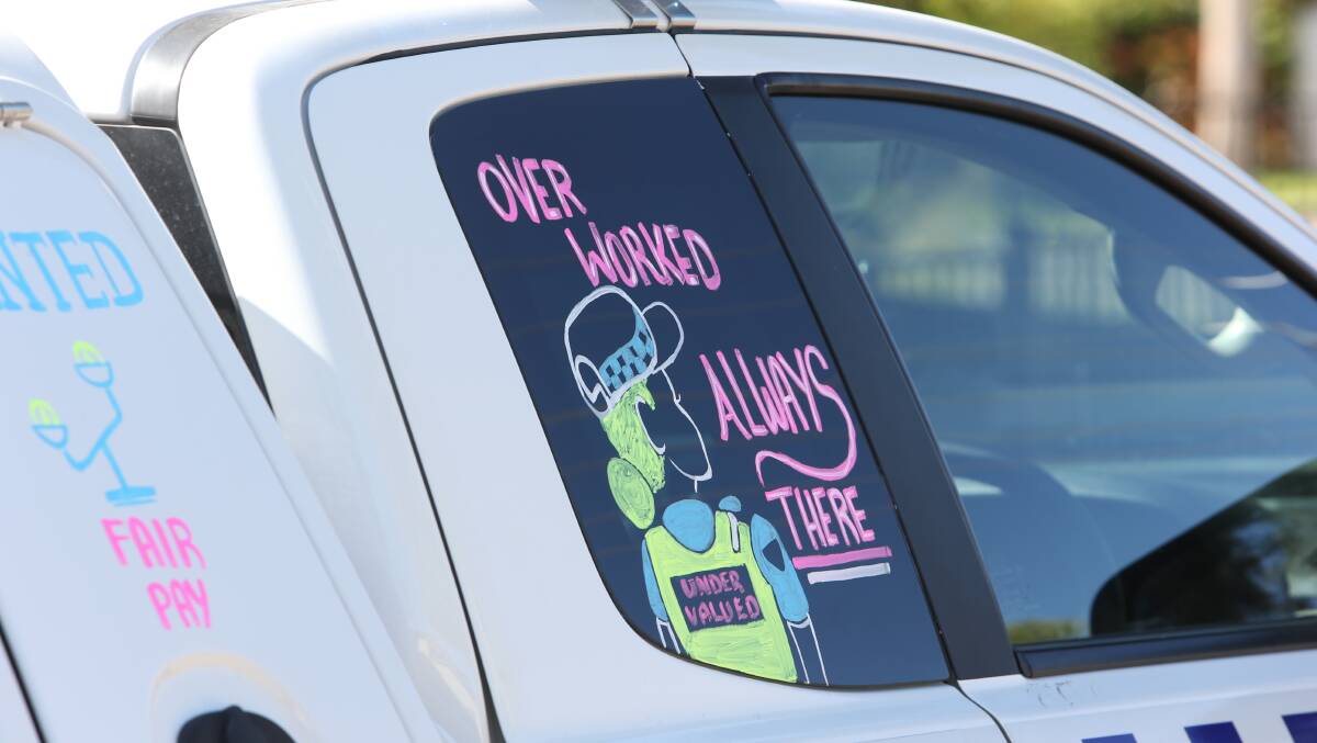 Messages written on a Wodonga police vehicle in December 2023 amid concerns over severe staffing shortages. File photo