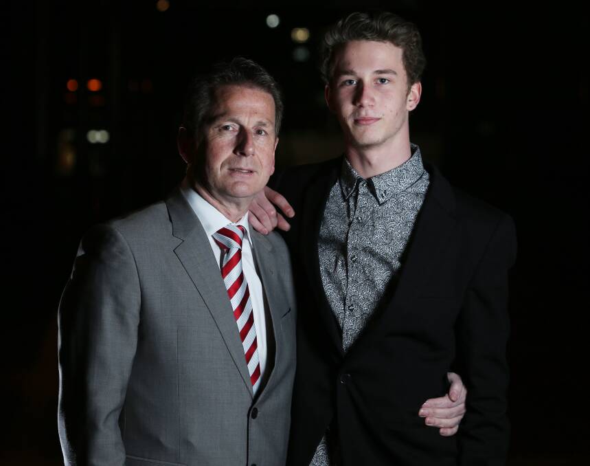 SOMBRE: Lee and Mitch Botting outside a debutante ball in Albury on Saturday night which paid tribute to their late son and brother, Spencer.