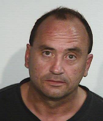 Martin Nicholas Russell, 41, has two outstanding warrants for intimidation offences. 