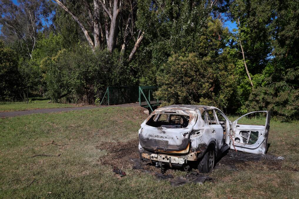 A car that was dumped and set on fire at the end of Heathwood Avenue in Lavington. Picture by James Wiltshire