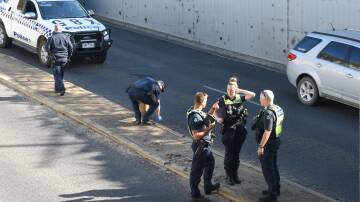 Police at the Rowan Street underpass in Wangaratta on Thursday, April 18. Picture by Wangaratta Chronicle 