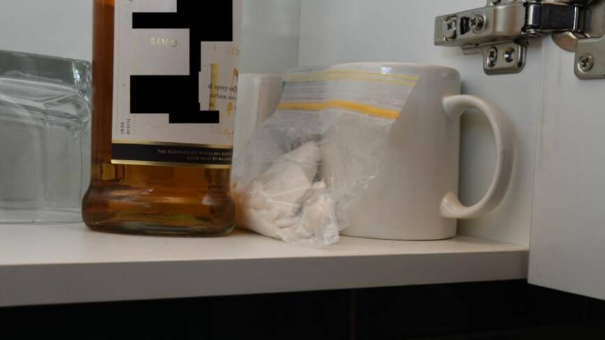 A seized bag of cocaine found on a shelf. Picture supplied