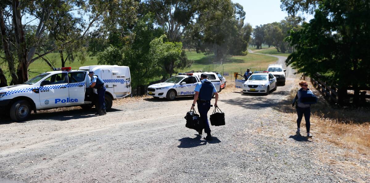 SEARCH: Police swarmed roads between Holbrook and Tarcutta on Monday after a possible sighting of Gino and Mark Stocco. Picture: MARK JESSER