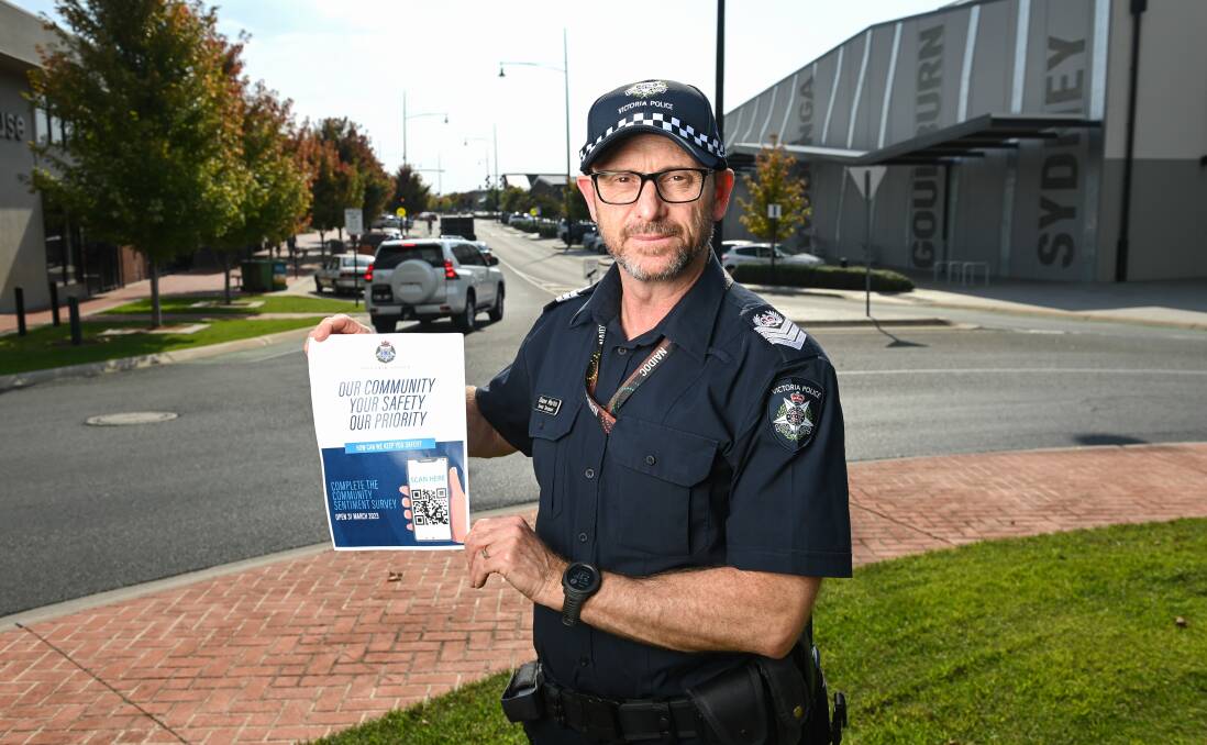Wodonga Senior Sergeant Shane Martin with a flyer highlighting the survey, which was launched last week. The results will be used to inform police of safety concerns and issues in the community. Picture by Mark Jesser