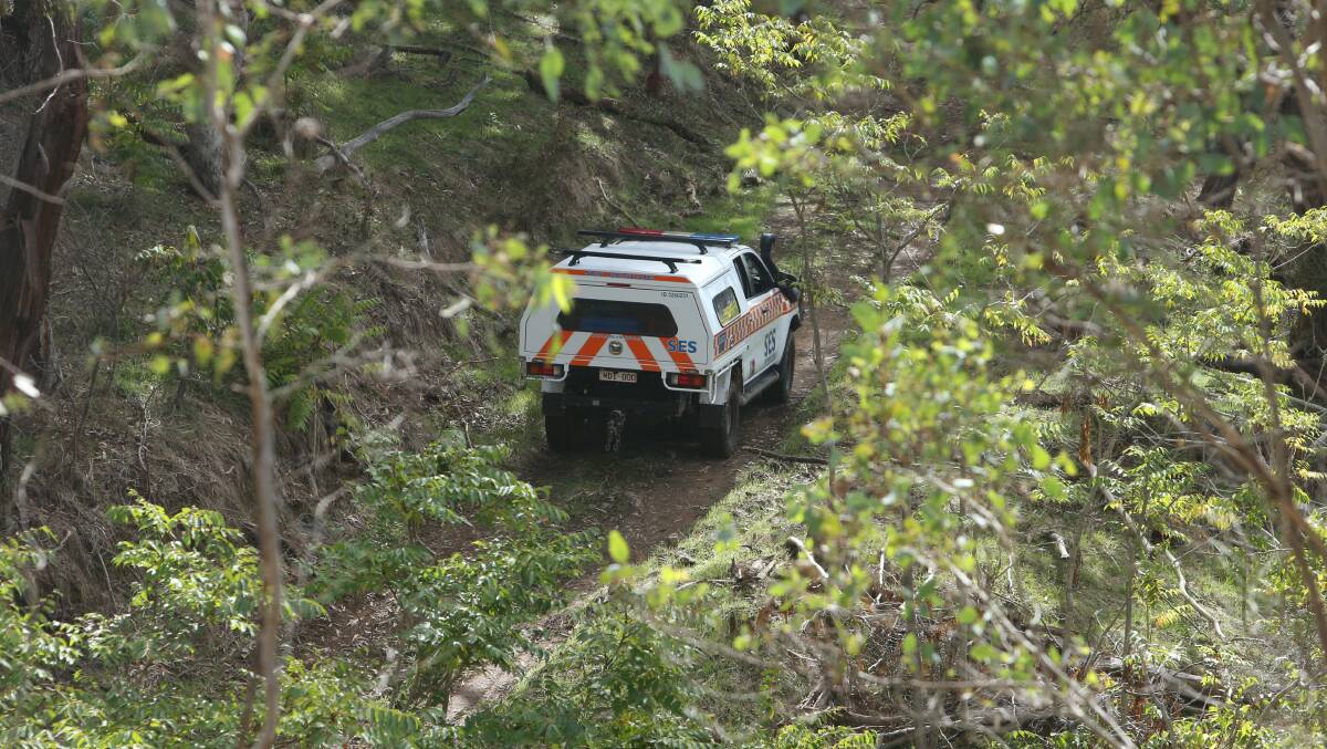 An SES vehicle climbs a steep track to access the site after crossing a creek. The injuries are not considered life threatening. Picture by Blair Thomson