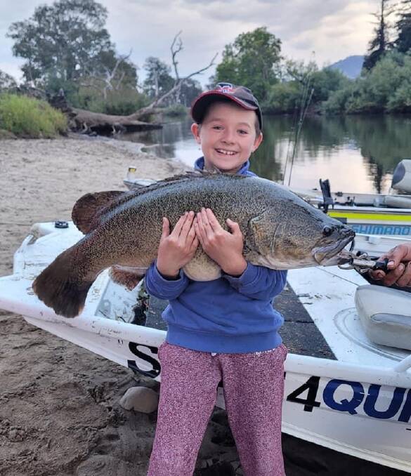 PROUD: Nine-year-old Declan Faithfull with a 93cm cod he caught in the Upper Murray.