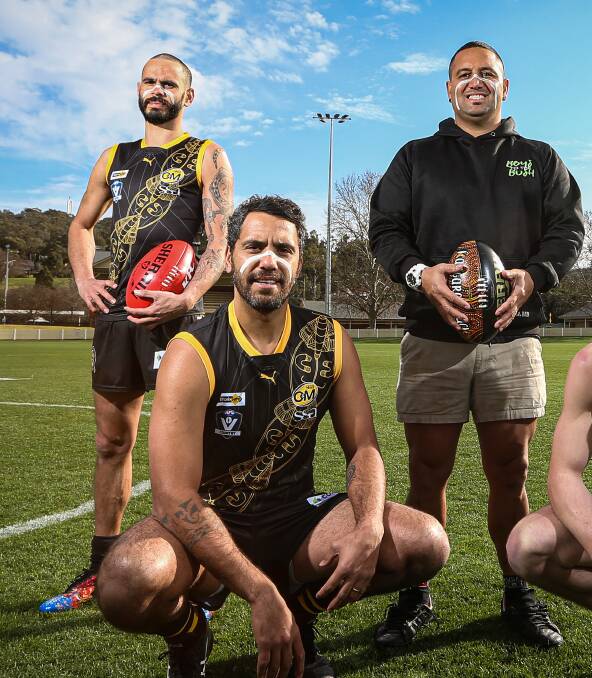 Dean Heta, centre, shows off Albury's Indigenous guernsey in 2021 with Jeff Garlett, left, and Johnny Murray, right. Picture by James Wiltshire